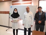 تجلیل از همکارگفتاردرمان بیمارستان امیرالمومنین (ع)